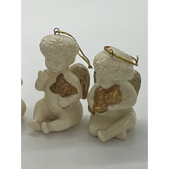 Set of 4 Ceramic White White Angel Ornaments with Gold Instruments and Wings 2" - Picture 6 of 8